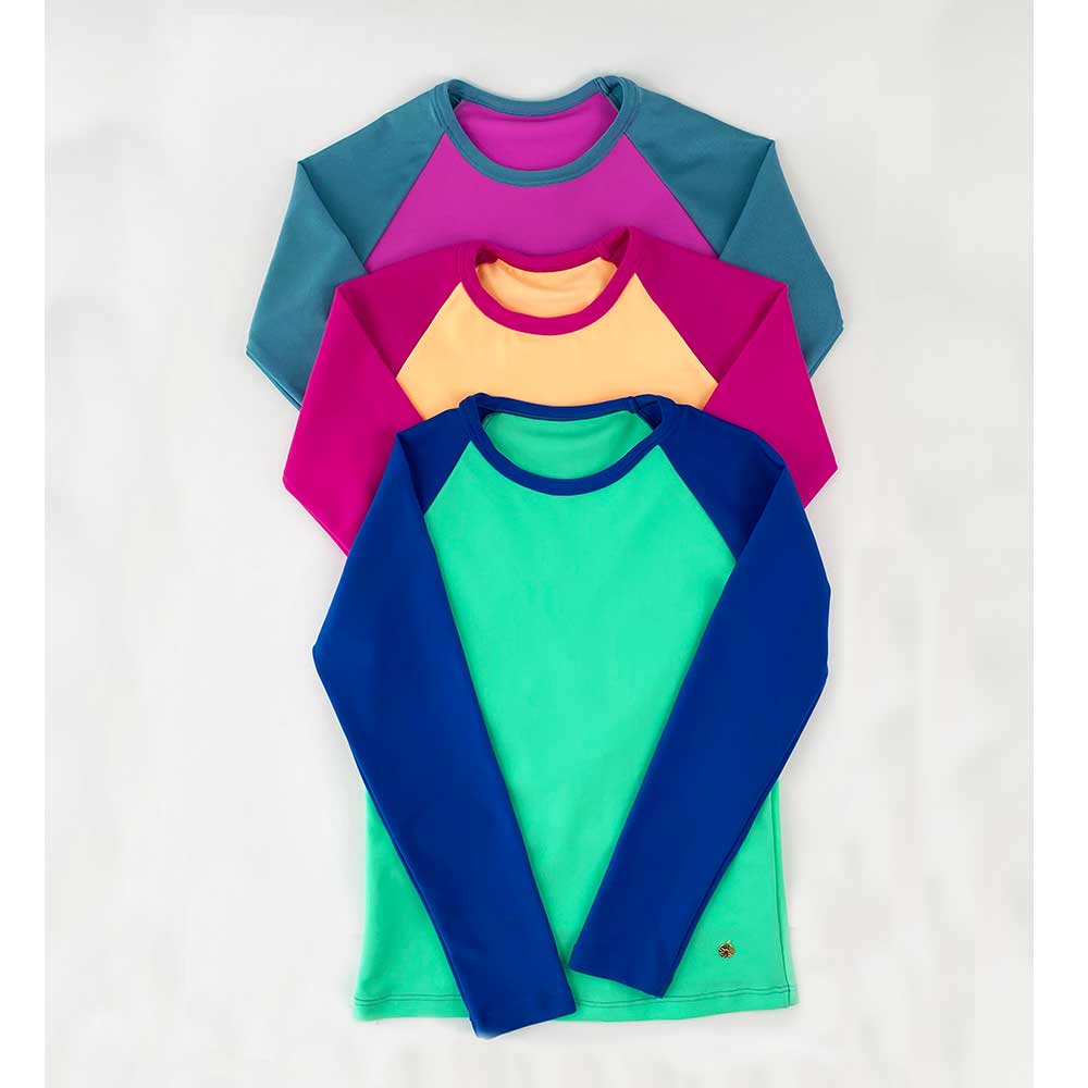 TRAJE DE BAÑO INFANTIL REMERA MANGAS LARGAS COMBINACA EN CONTRASTE